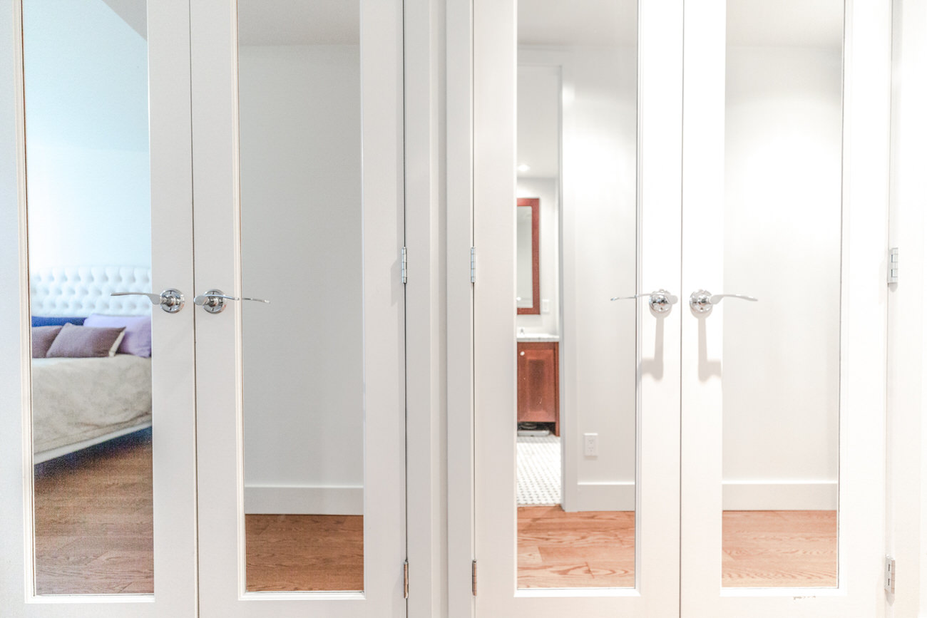 Mirrored closet inside Downtown Vancouver rental condo.