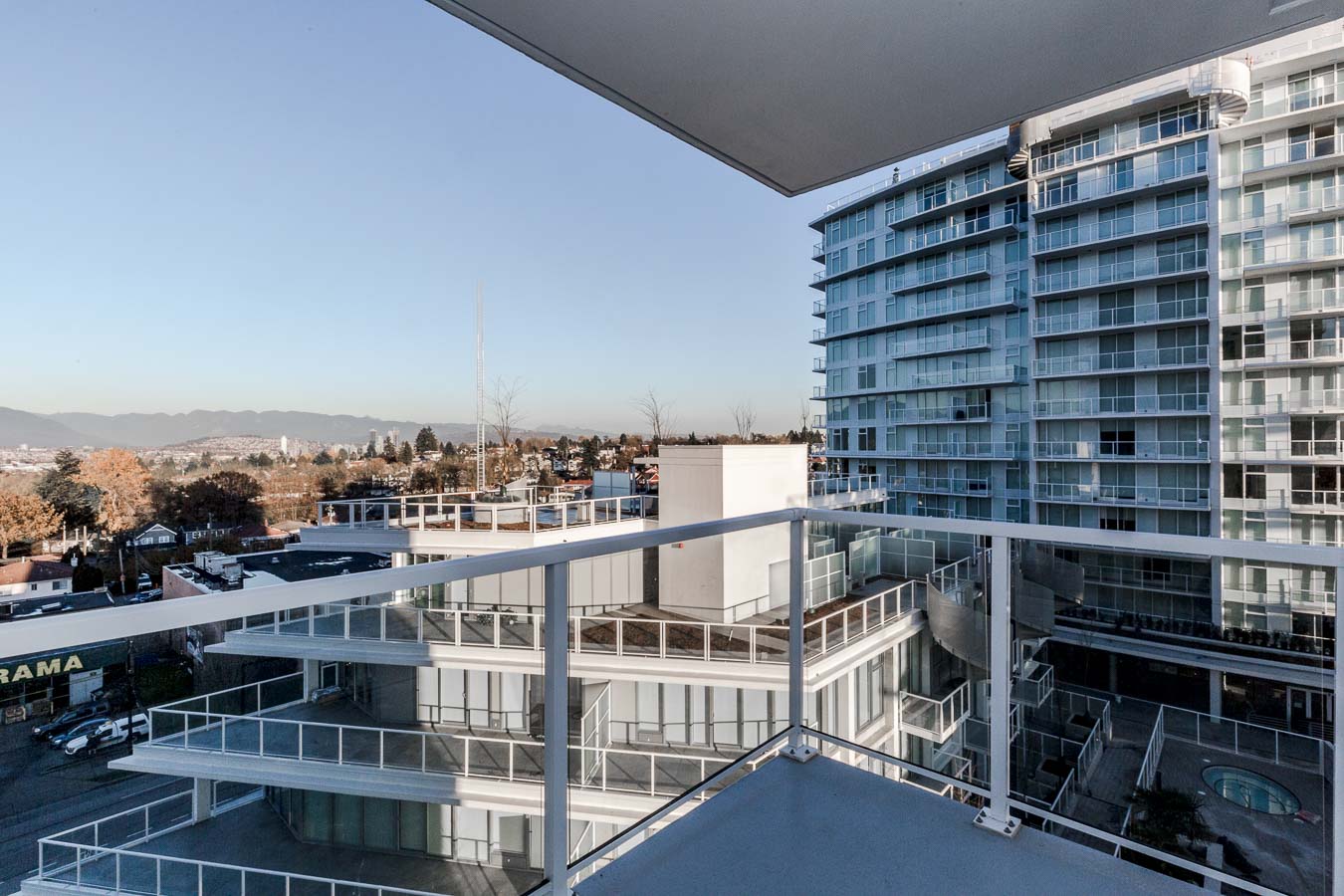 Private balcony offering view of Vancouver at luxury condo rental managed by Birds Nest Properties.