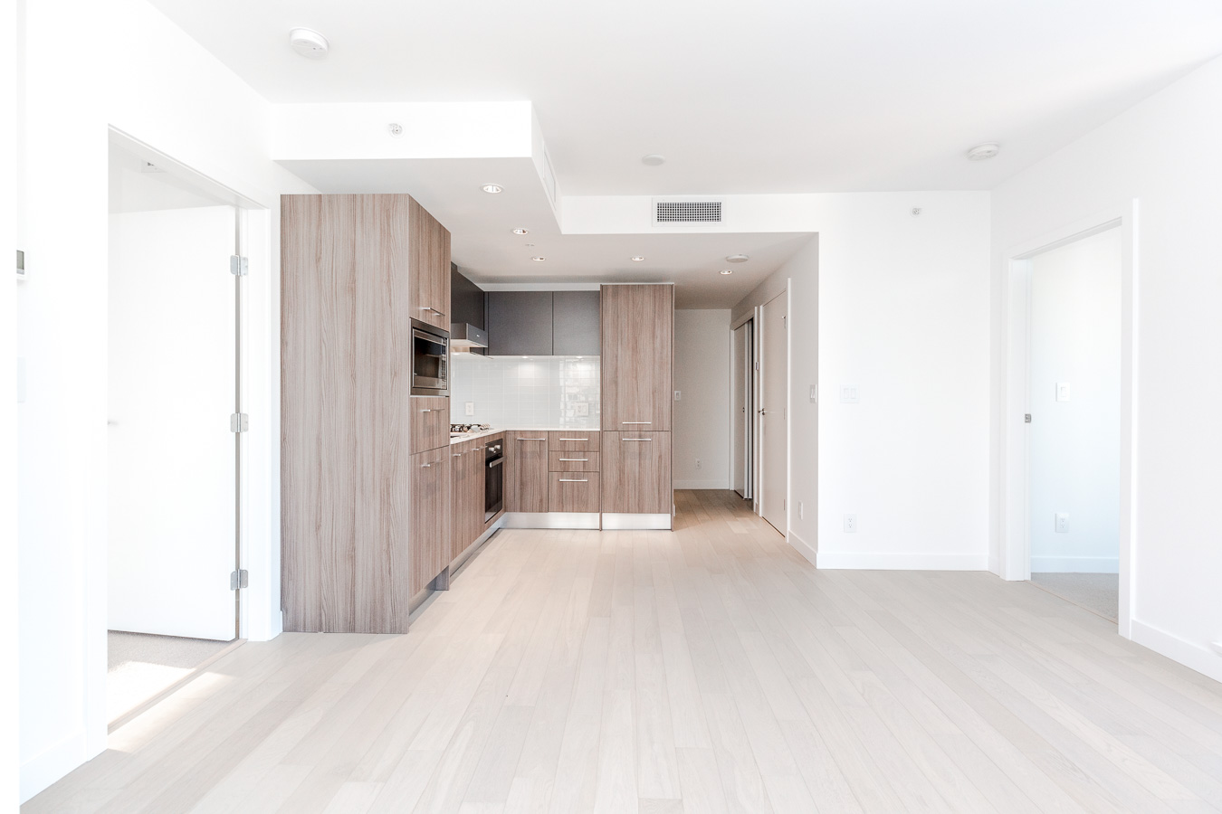 Kitchen and dining area at brand new Vancouver condo rental managed by Birds Nest Properties.