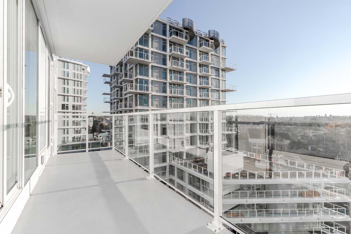 view on balcony of rental condo with view of adjacent condo building