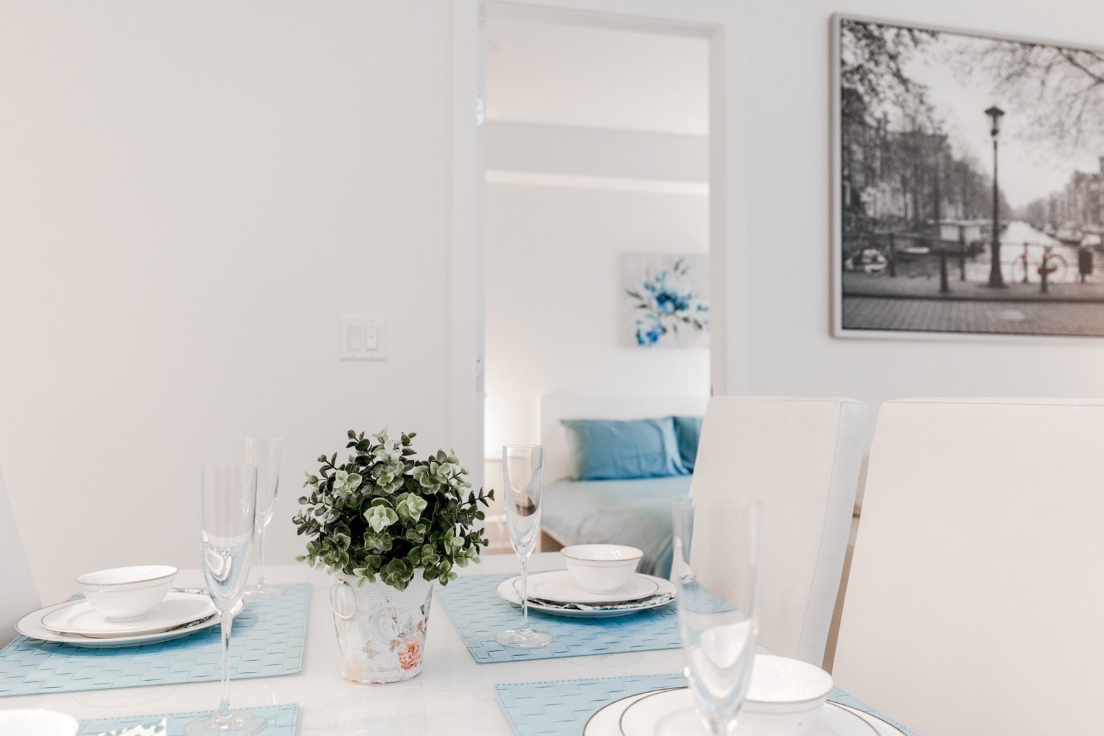 View of Dining Table and Bedroom at Furnished Richmond Luxury Condo