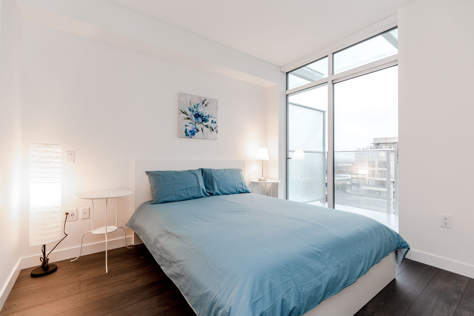 Bedroom With Blue Duvet at Richmond Condo For Rent