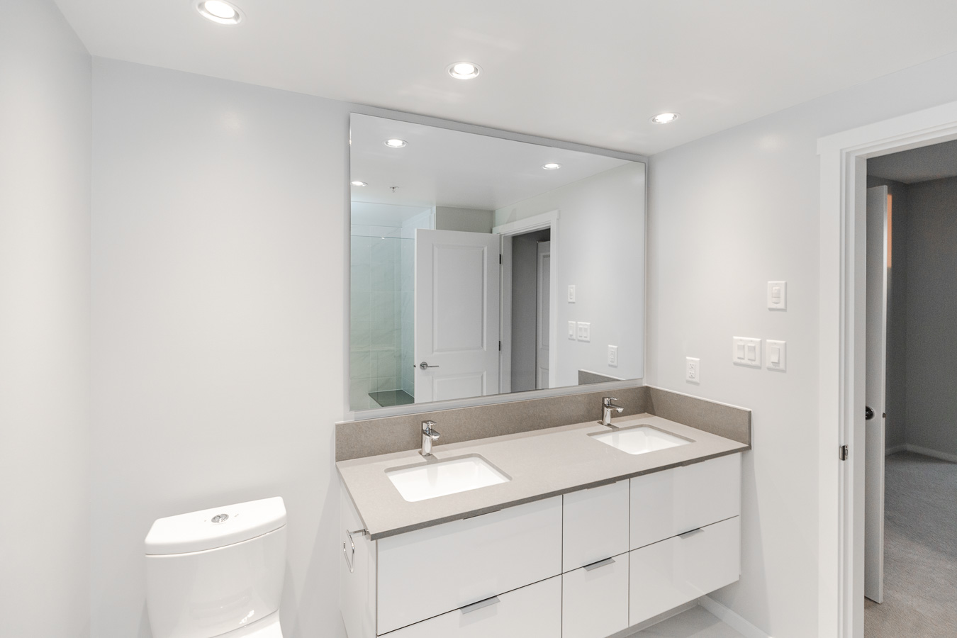 Two sink bathroom at Metrotown rental condo managed by Birds Nest Properties.