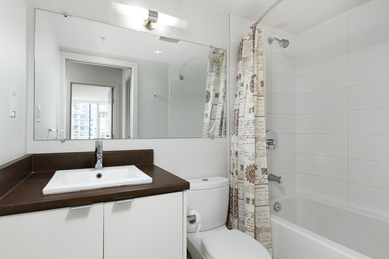 Bathroom at furnished Downtown Vancouver condo managed by Birds Nest Properties.