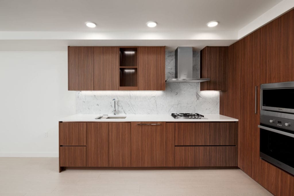 Kitchen with stainless steel appliances in luxury Vancouver rental condo.