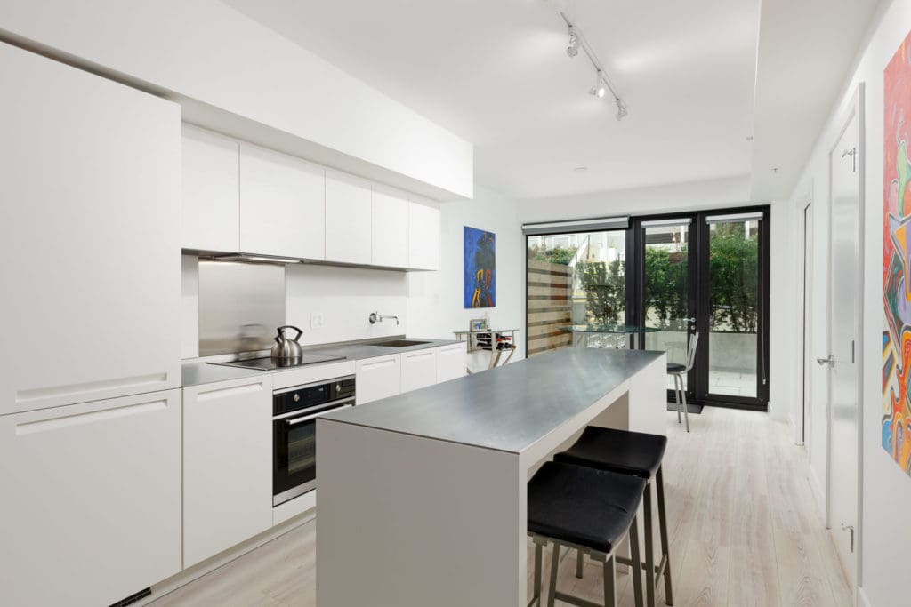 Kitchen and dining area at Downtown Vancouver condo rental managed by Birds Nest Properties.