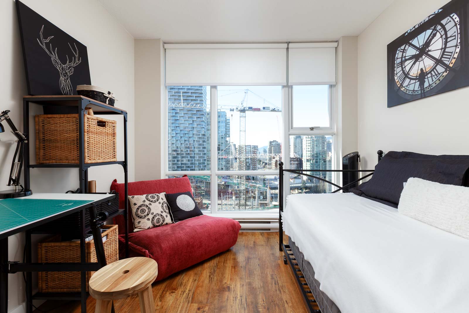 Bedroom in Yaletown Vancouver condo with view.