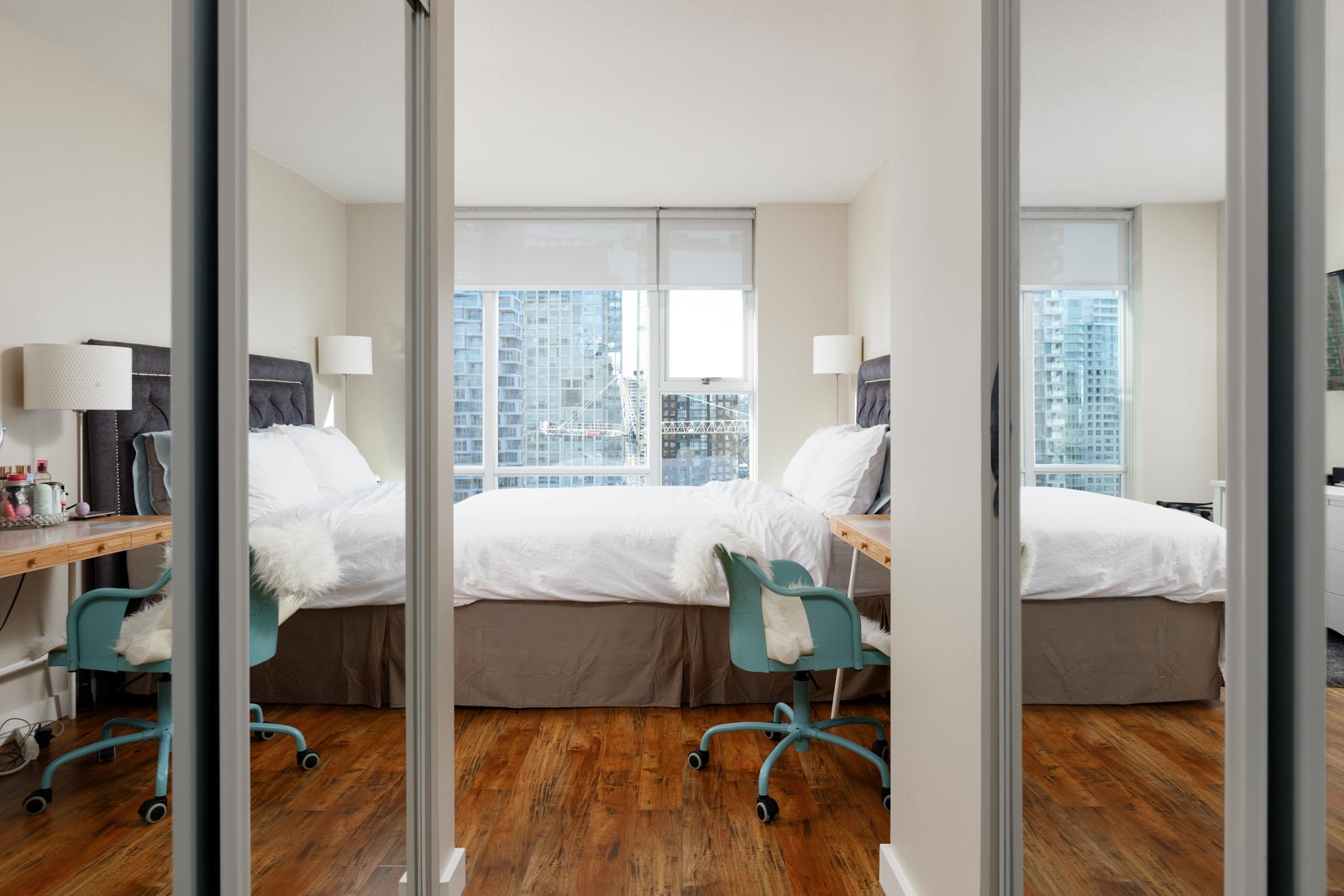 Bedroom with view in Yaletown Vancouver rental condo.