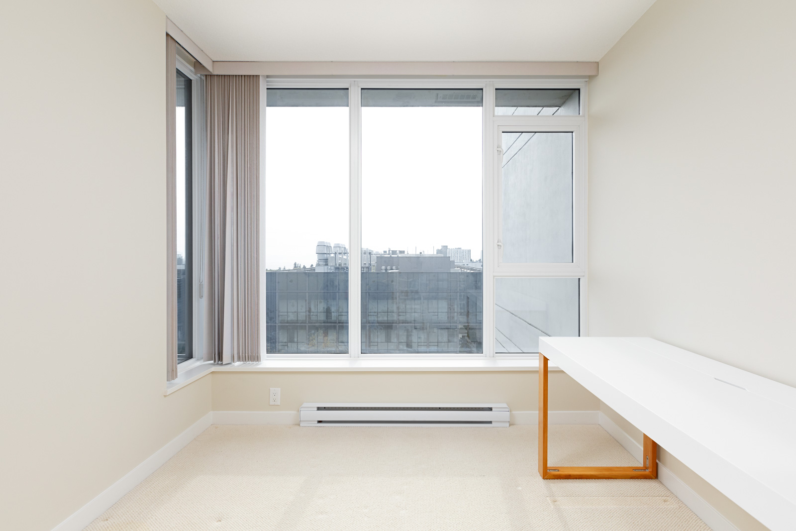 Bedroom in UBC rental condo with view.