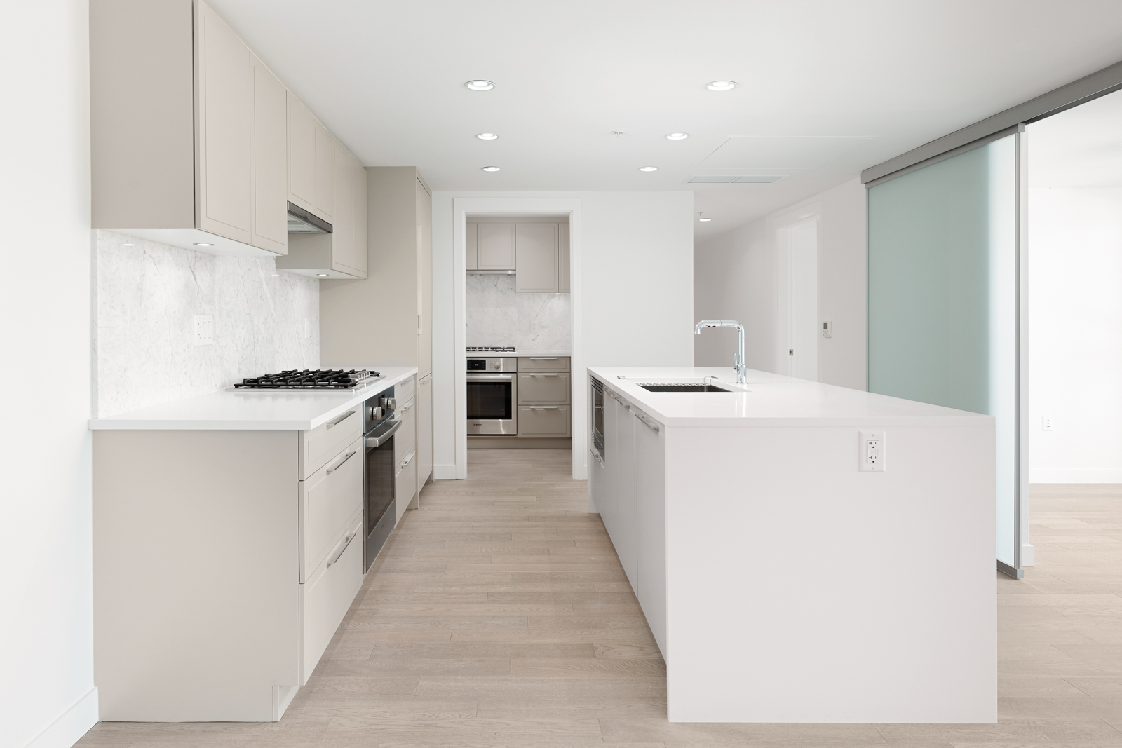 Kitchen with stainless steel appliances in Vancouver's Marpole community.