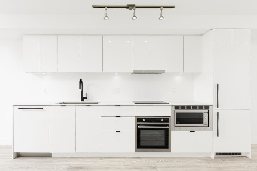 Kitchen with stainless steel appliances in Vancouver rental condo.