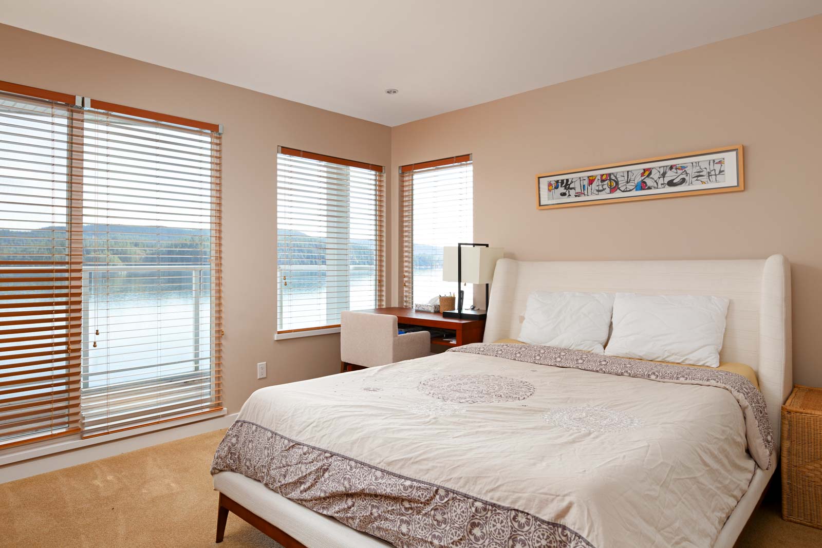 North Vancouver luxury bedroom overlooking waterfront view.