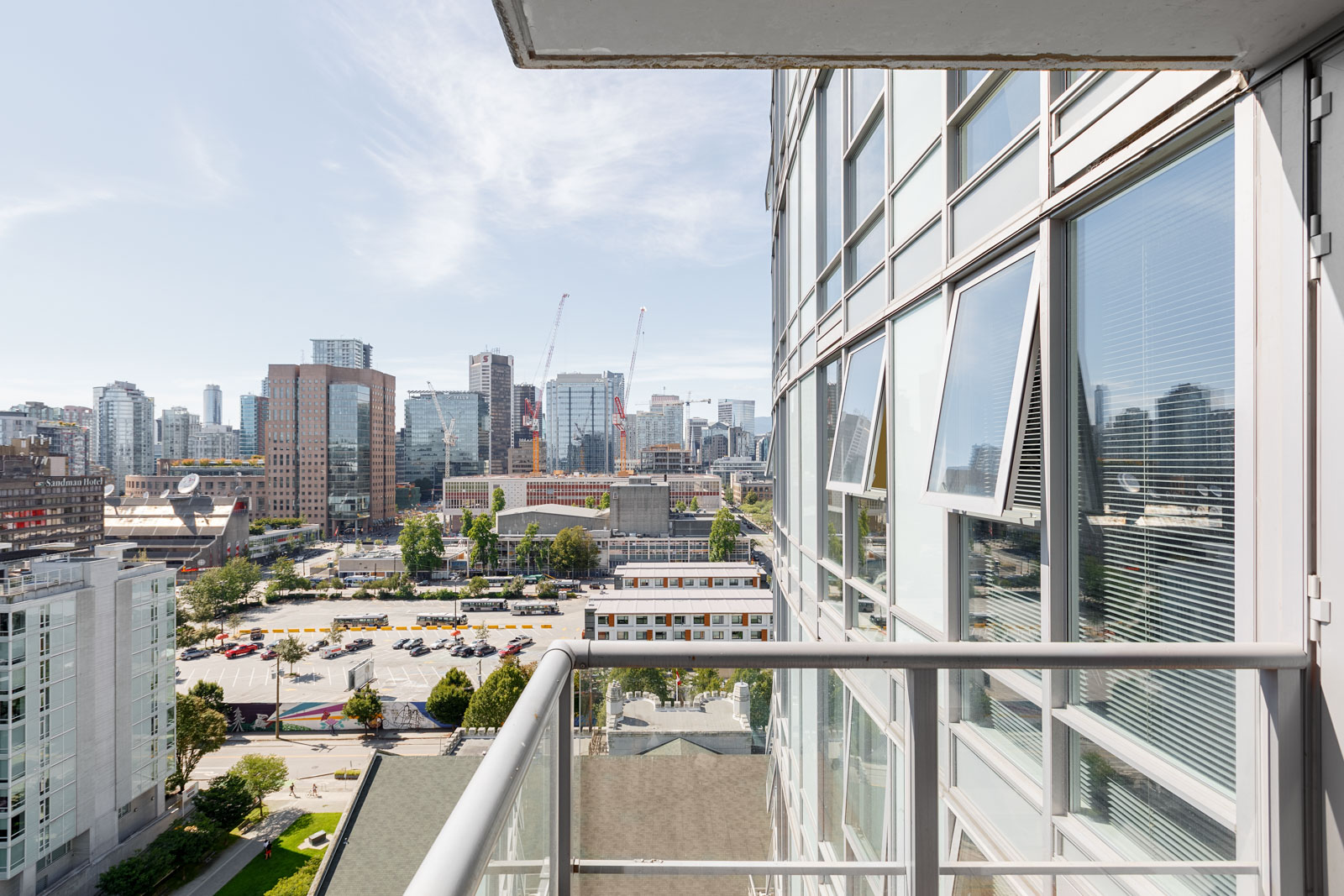 Private balcony of Downtown Vancouver rental condo overlooking the city.