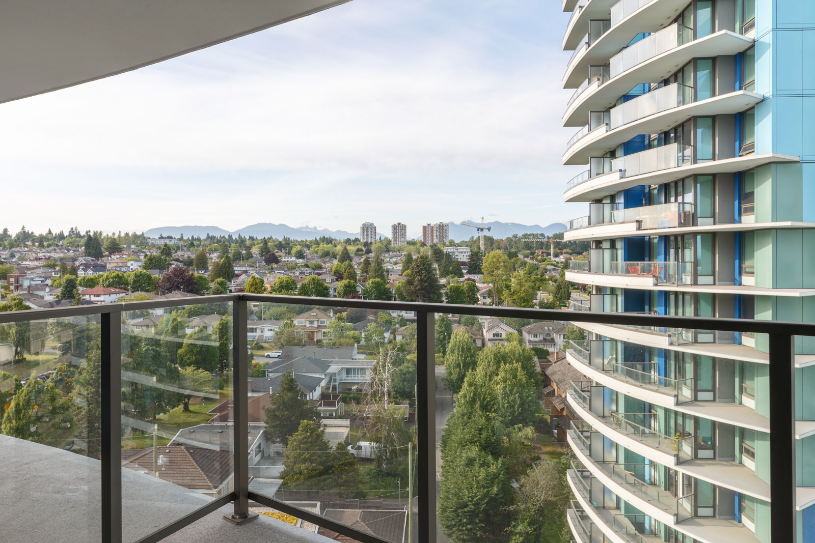 Private balcony of luxury Vancouver rental condo with view.