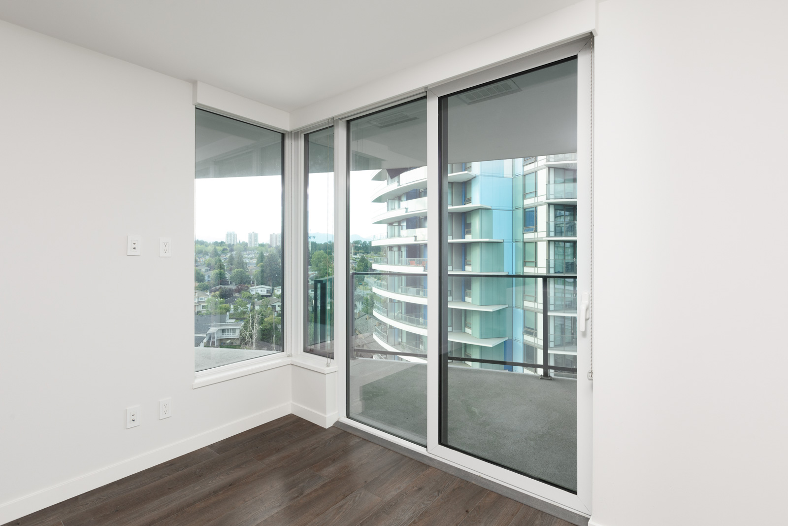 Sliding door to private balcony of luxury Vancouver rental condo.