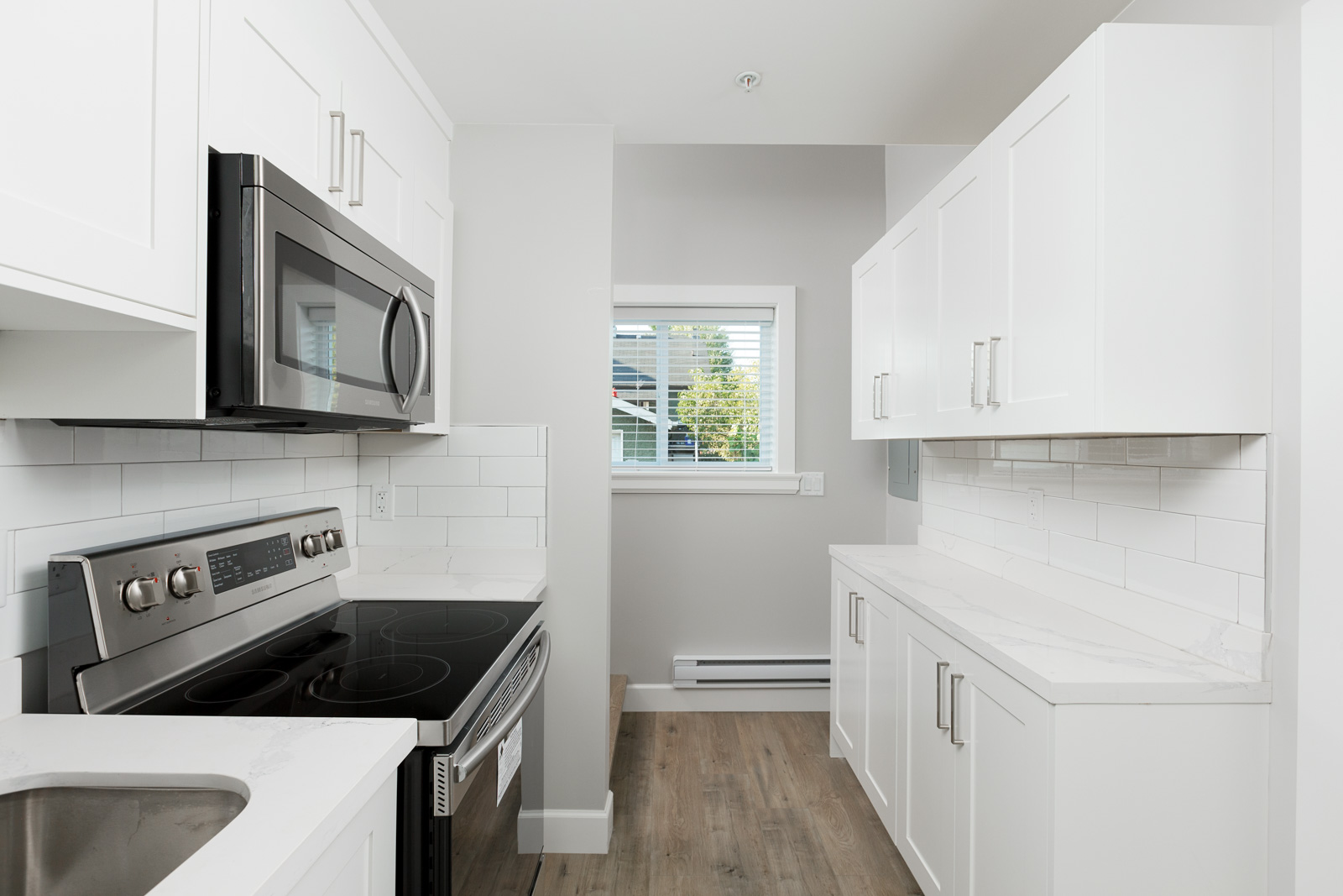 Kitchen of Vancouver unfurnished rental with stainless steel appliances.