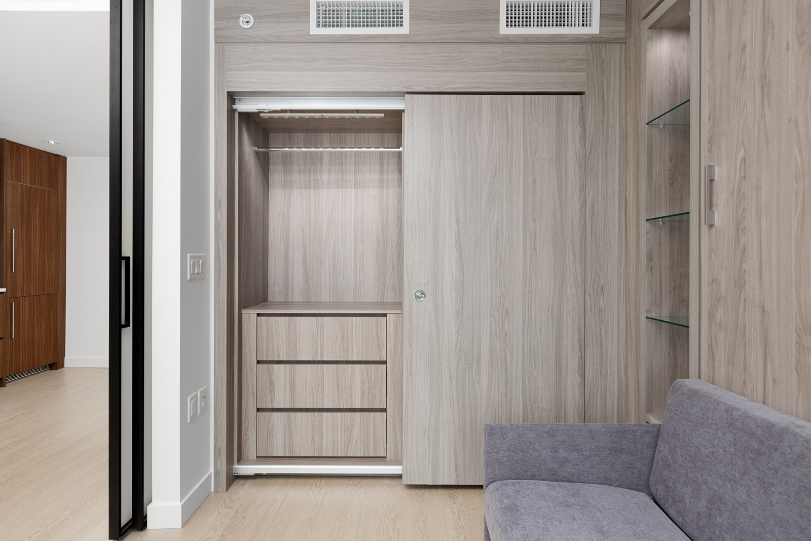 bedroom closet with shelving in arc rental condo unit