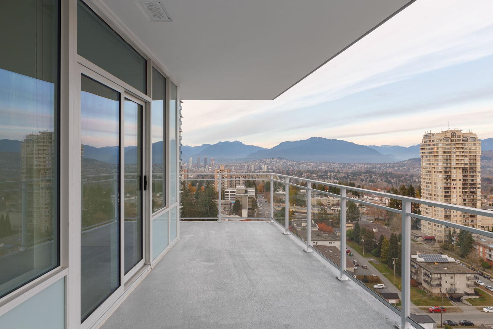 balcony with mountain view and clear skies from imperial street metrotown burnaby condo for rent