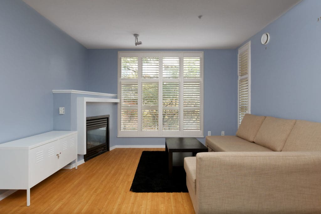 living room with blue walls at burnaby condo