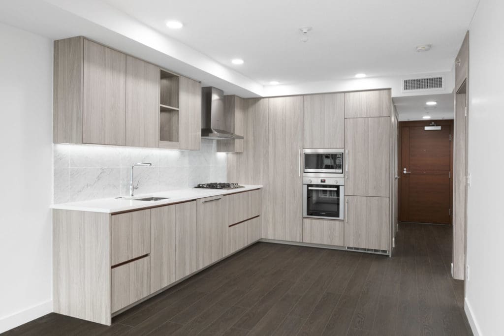 modern kitchen of new empty living room in concord gardens south estate on hazelbridge in richmond