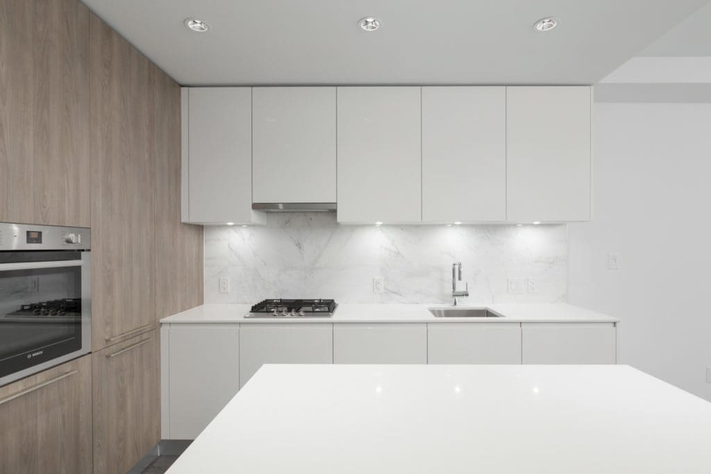 kitchen wall with white cabinets in brand new condo at brentwood tower one of amazing brentwood in burnaby