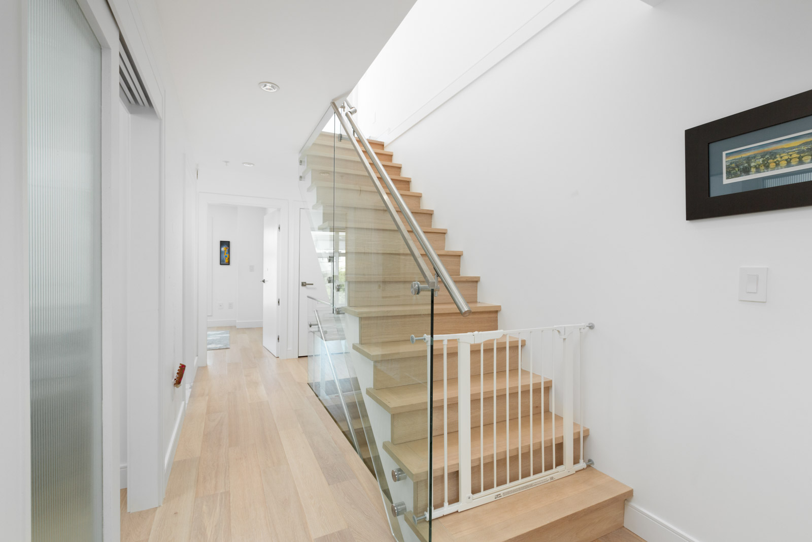 stairs with children gate of rental condo near commercial drive in east vancouver