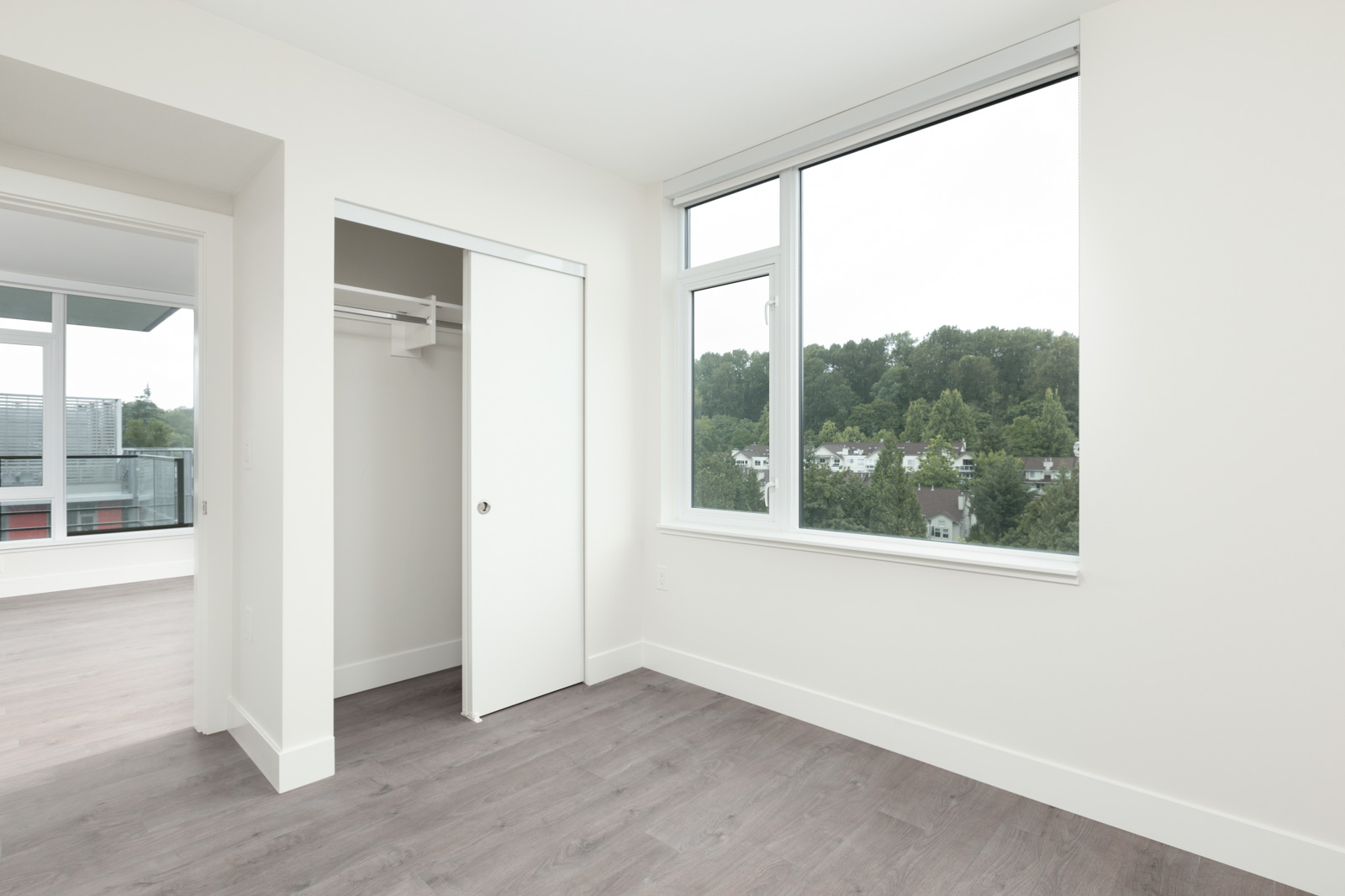 bedroom with white walls and window in rental condo in the Downtown neighbourhood of Vancouver