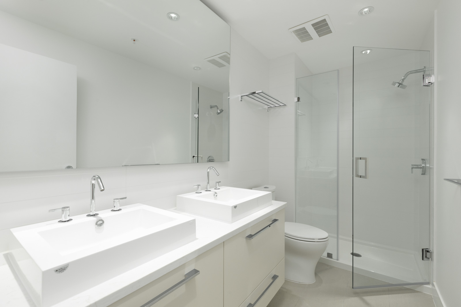 Bathroom with white walls and him/her sink