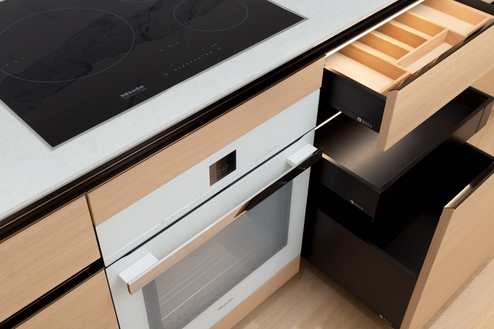 stovetop and oven in brand new cardero building designed by henriquez partners architects in coal harbour in downtown vancouver
