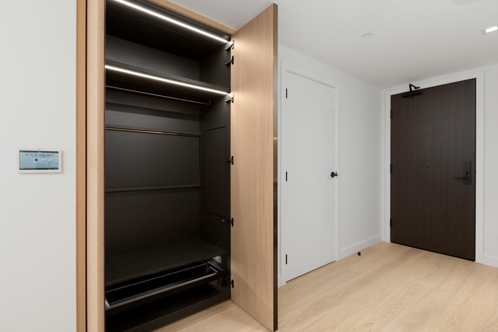wardrobe in brand new cardero building designed by henriquez partners architects in coal harbour in downtown vancouver