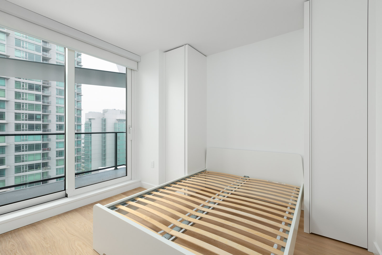 murphy bed in bedroom of in brand new rental in cardero building designed by henriquez partners architects in coal harbour in downtown vancouver