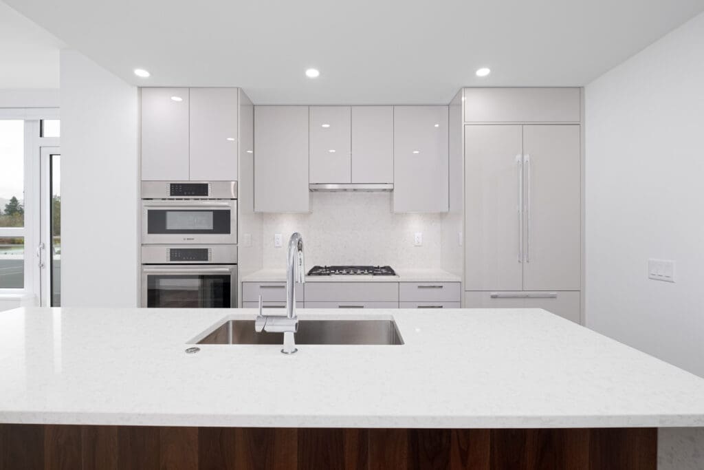 kitchen with quartz countertops in brand new rental condo apartment of basalt developed by pennyfarthing homes in vancouver westside