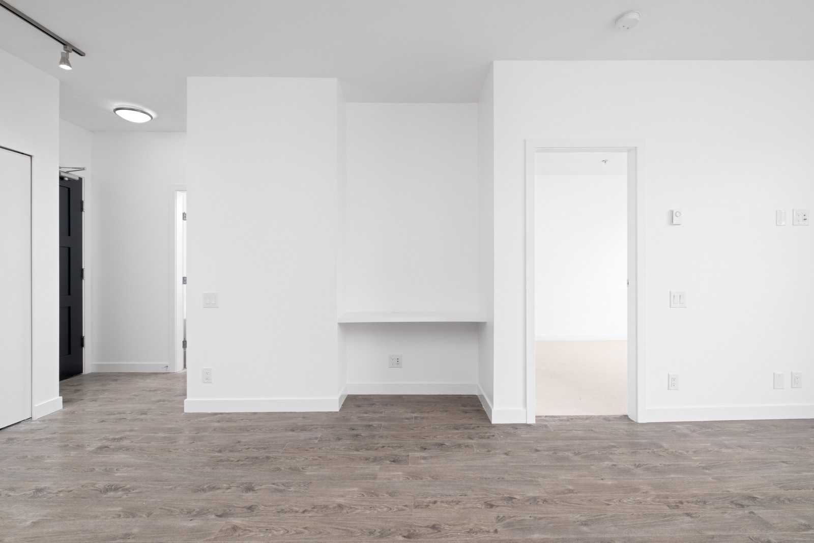 living room with hardwood floors in rental condo in the Lougheed Town Centre neighbourhood of Coquitlam