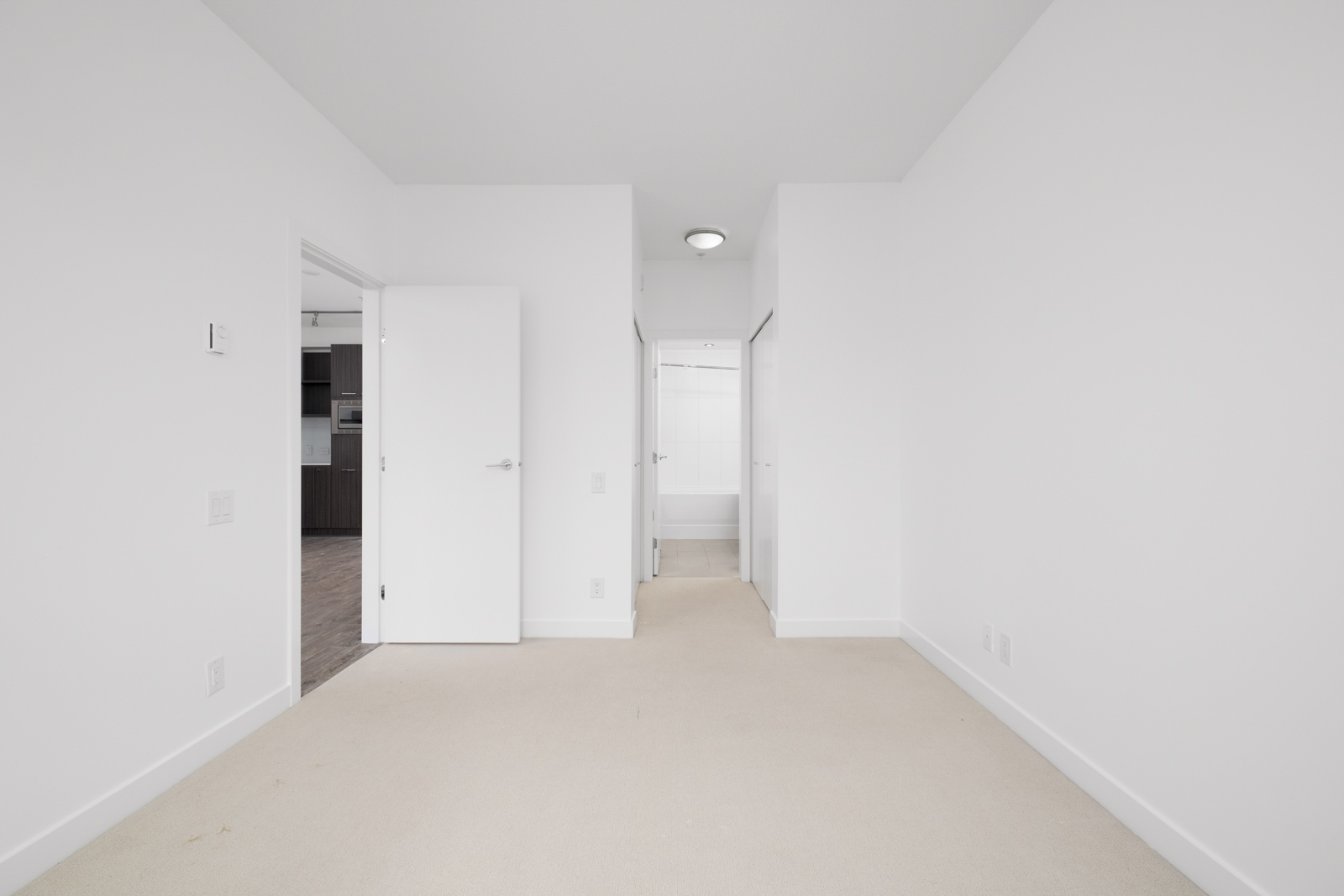 bedroom with closet in rental condo at Foster East in the Lougheed Town Centre neighbourhood of Coquitlam