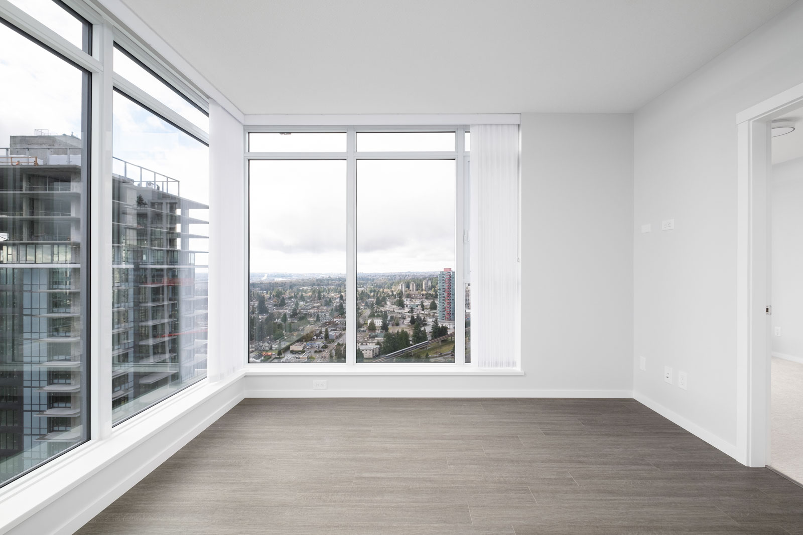 living room with hardwood floors in rental condo in the Metrotown neighbourhood of Burnaby