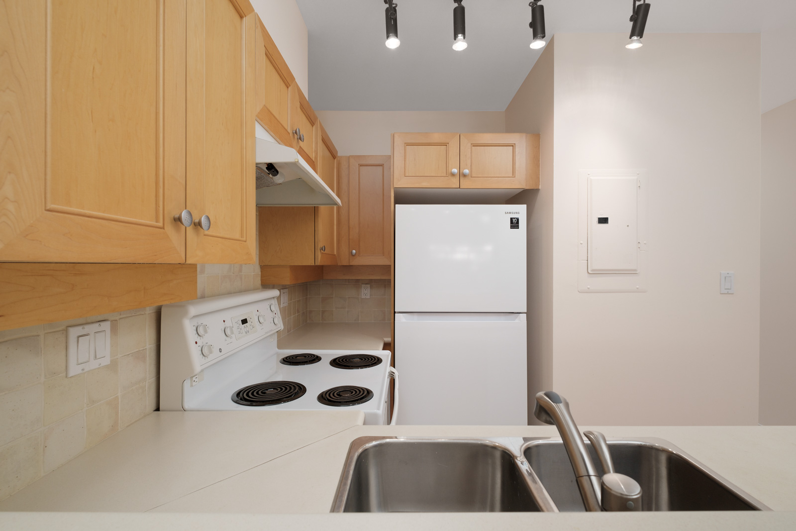 kitchen with white stove in kitsilano rental studio apartment in vancouver westside
