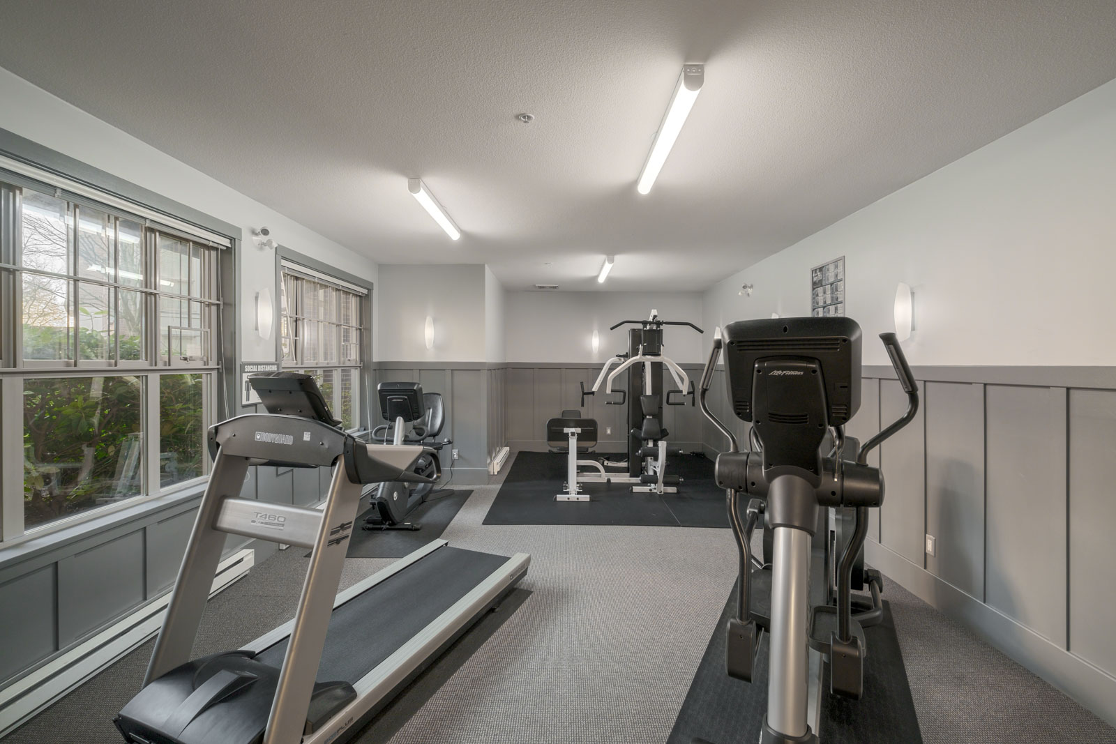 gym with treadmills and stationary bikes in alexandra house residential building in vancouver westside