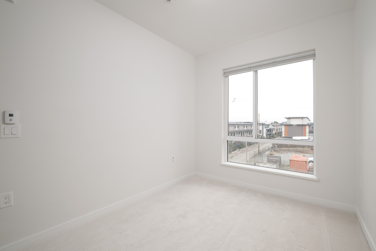living room with view in rental condo at 205-615 East 3rd Street in North Vancouver