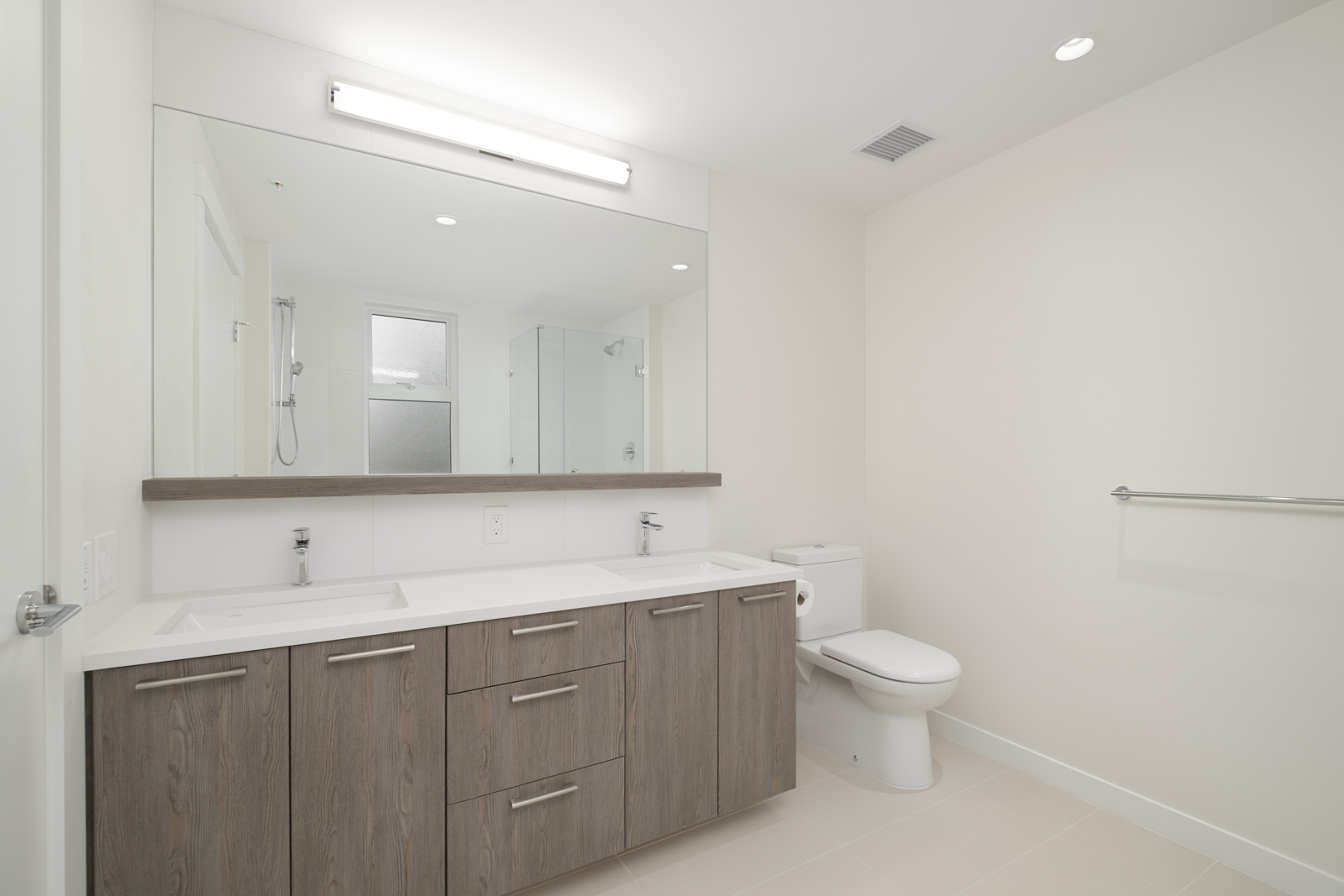 Bathroom with white walls and him/her sink
