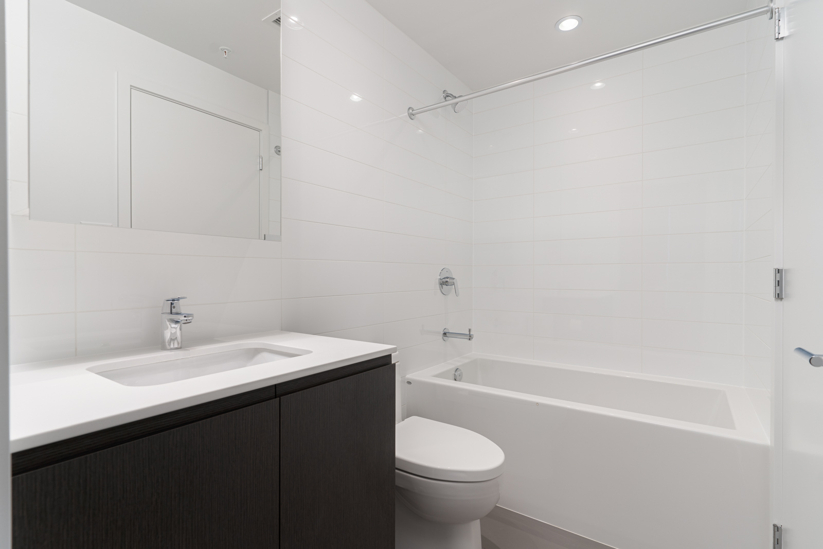 Bathroom with white walls and him/her sink