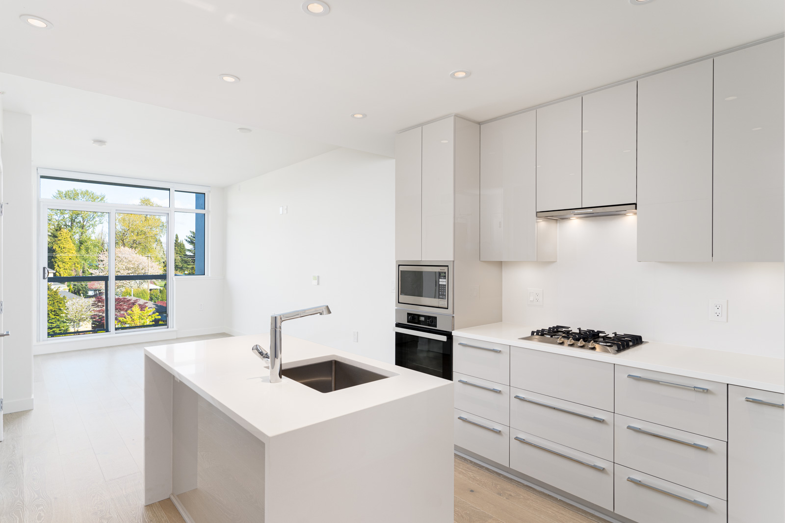 Kitchen with large marble style island