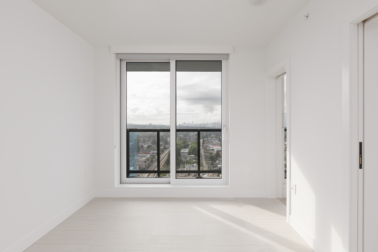 bedroom with closet in rental condo at Kings Crossing I in the Joyce neighbourhood of Vancouver