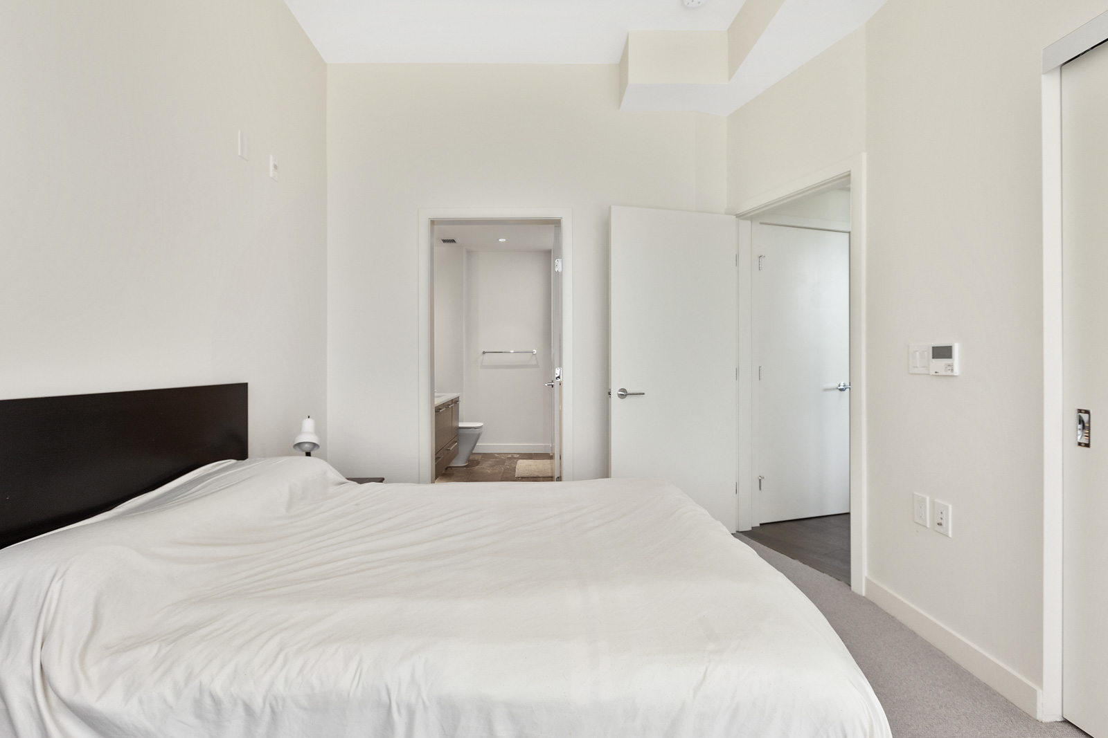 bedroom with walk in closet in property managed by birds nest properties