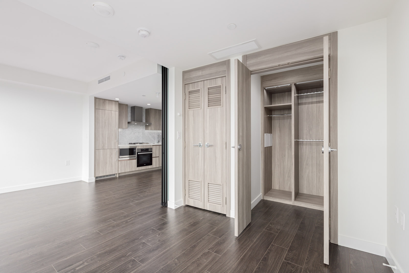 living room in newly built Olympic Village condo