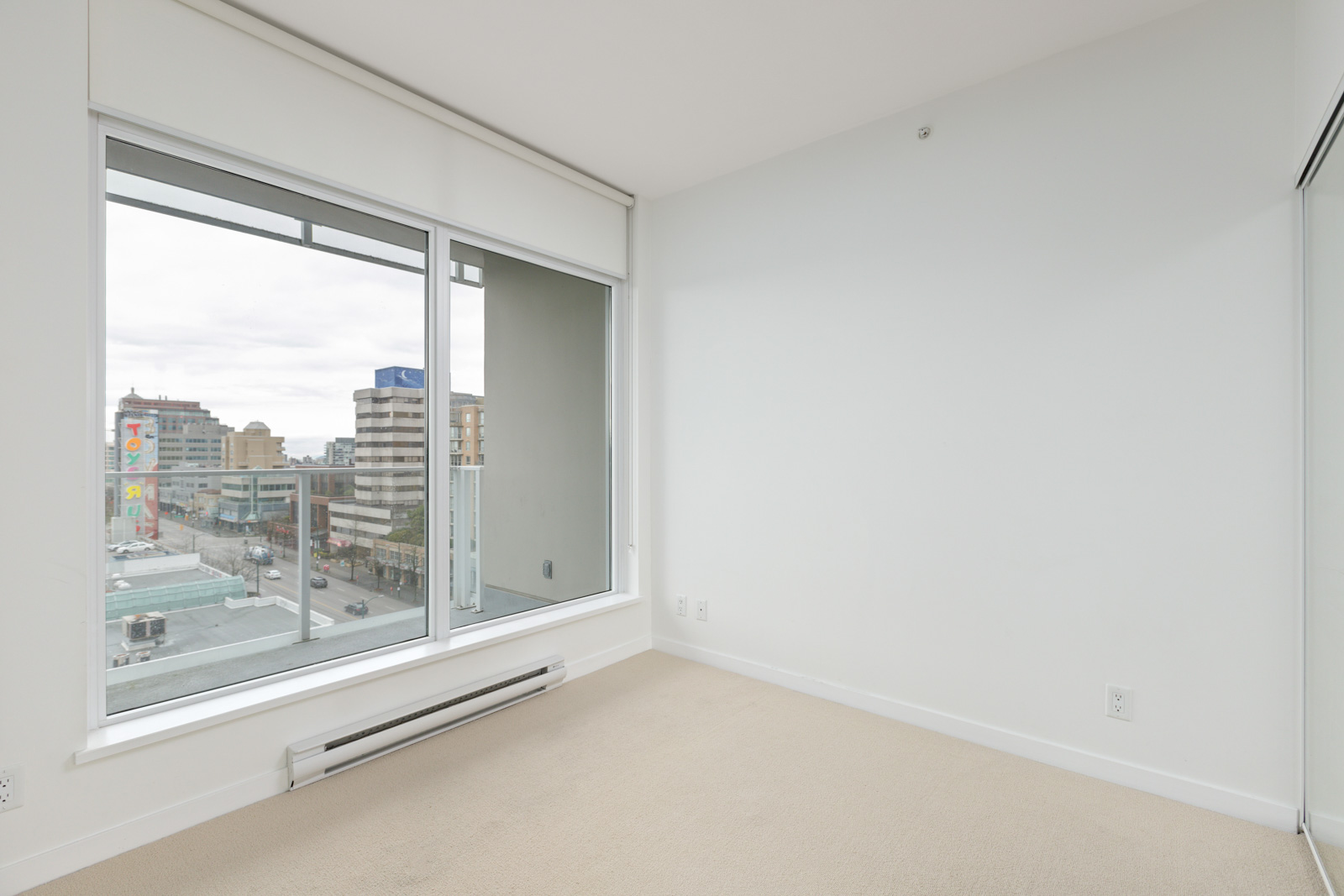 bedroom in upscale condo in Vancouver's Fairview neighbourhood