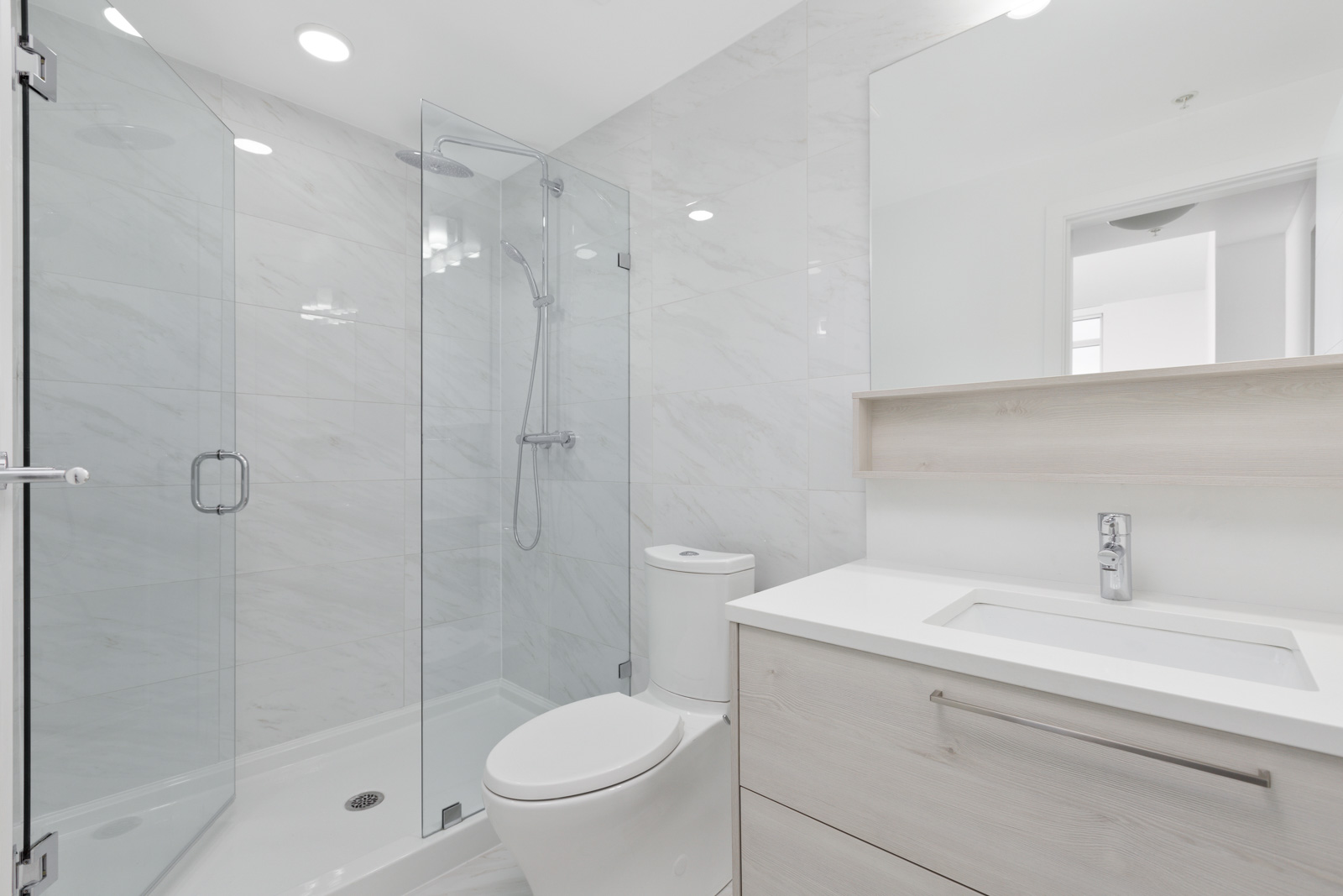 white bathroom at Sun Tower 1 building in Burnaby’s Metrotown