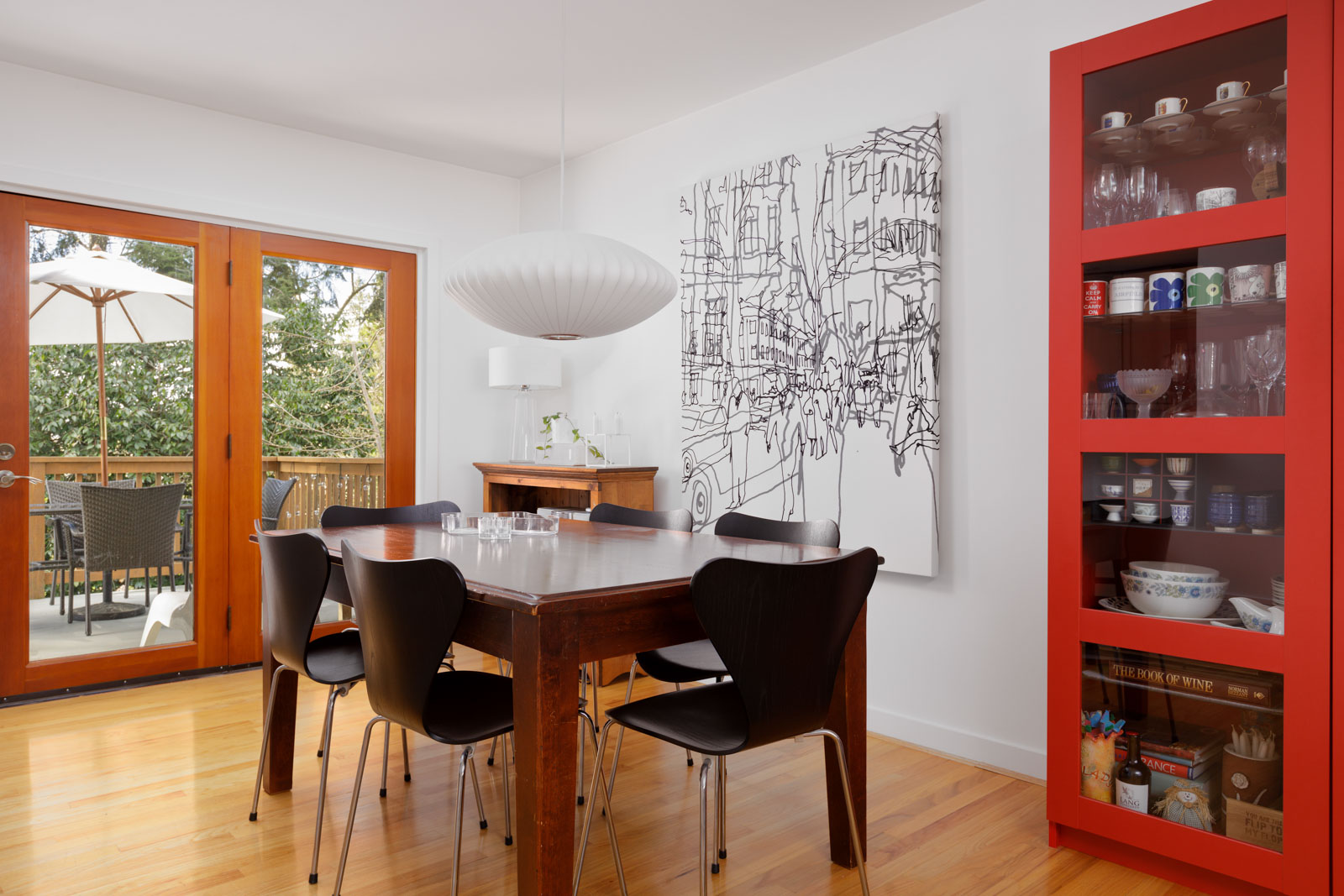 dining room area with large doors to back deck