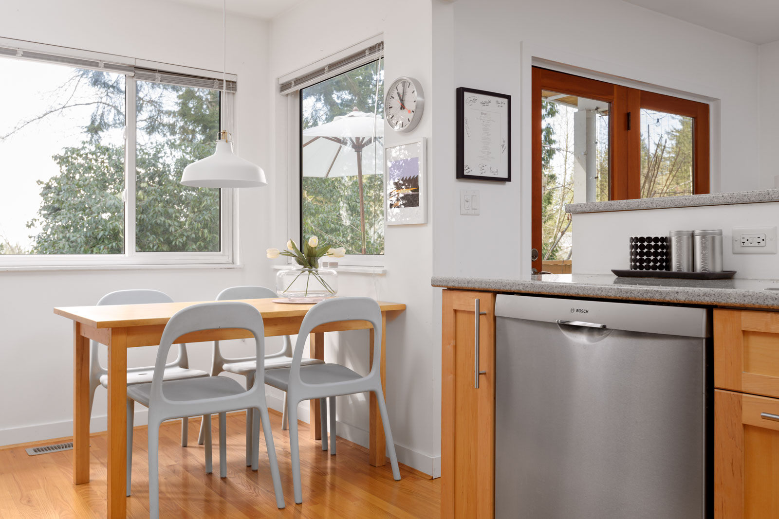 eat in kitchen nook with stainless steel appliances