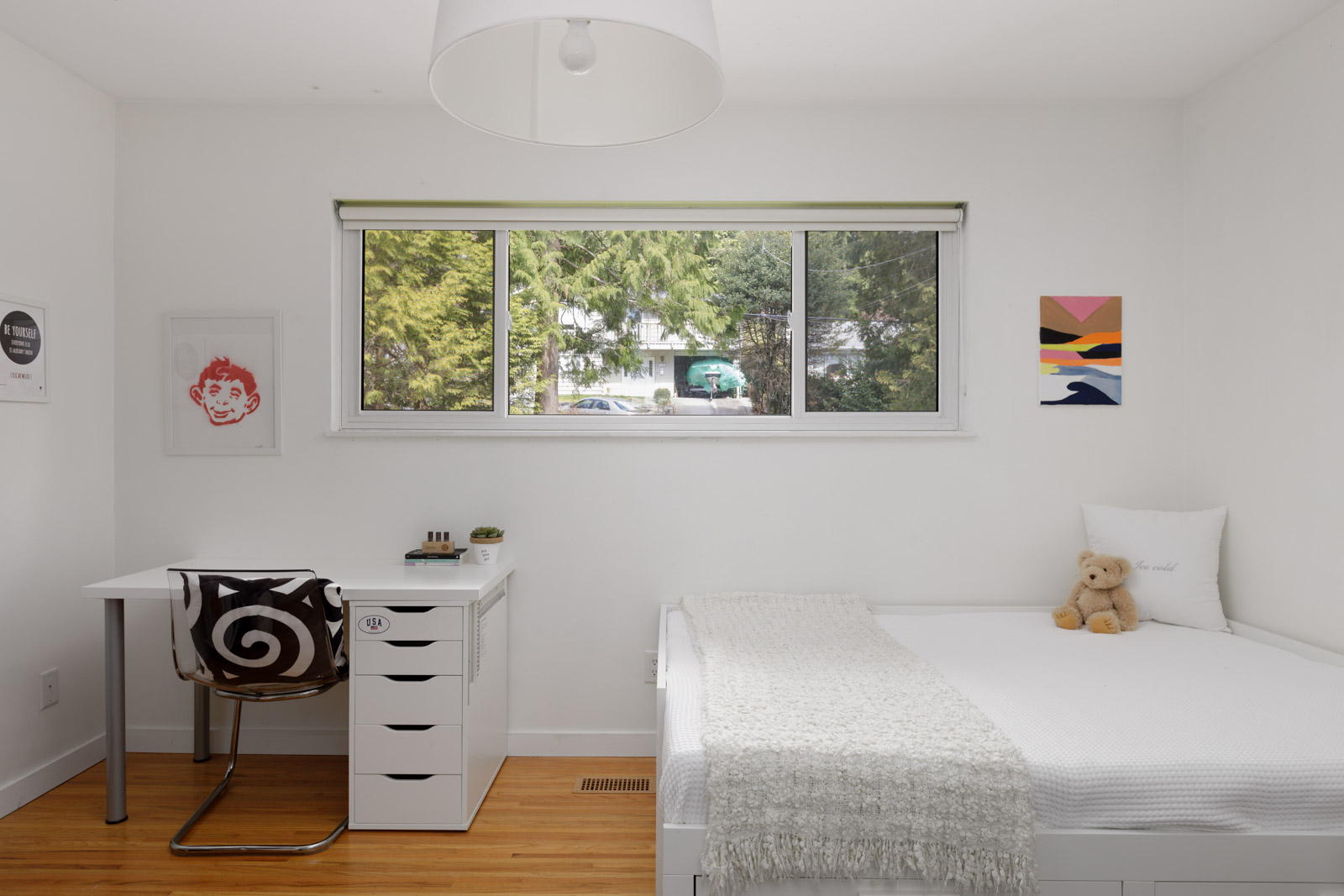 bedroom with window on lower level