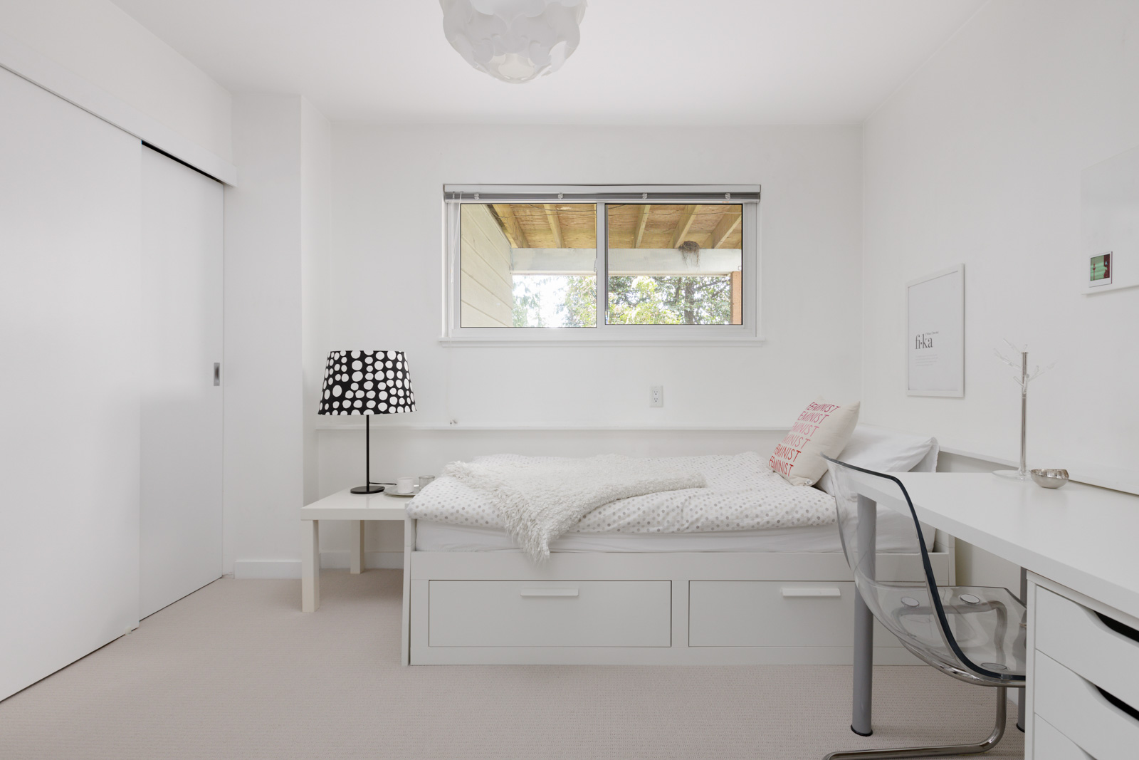 bedroom on lower level with carpet